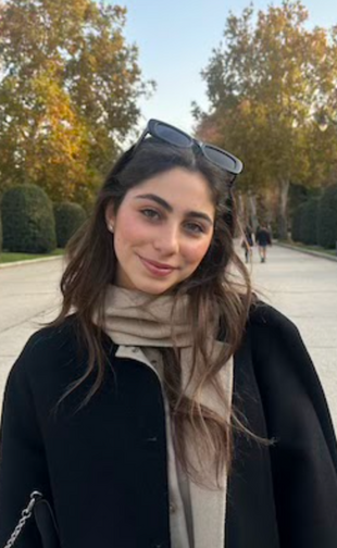 Smiling portrait in black coat